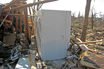 Safe Room in Joplin, Missouri with damage all around