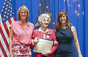 Photo of Dorothy Kessner receiving the award