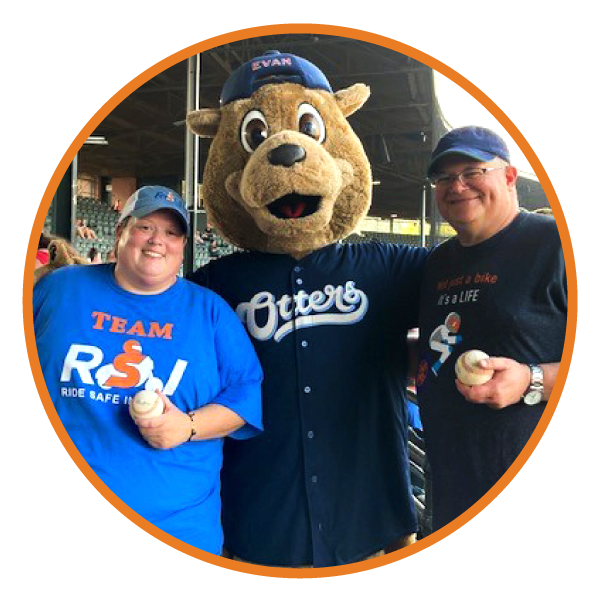 Jenna Brown from RSI and Chris Norrington, Evansville branch manager, posing with the Otters mascot