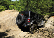A Jeep heads down Big Bertha. Challenge areas are placed throughout Redbird; the largest lies within Trail 3&rsquo;s loop. Challenge areas have few trail markings and quickly shift from being somewhat easy to extremely difficult.