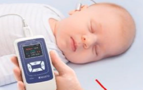 hearing screening being performed on baby