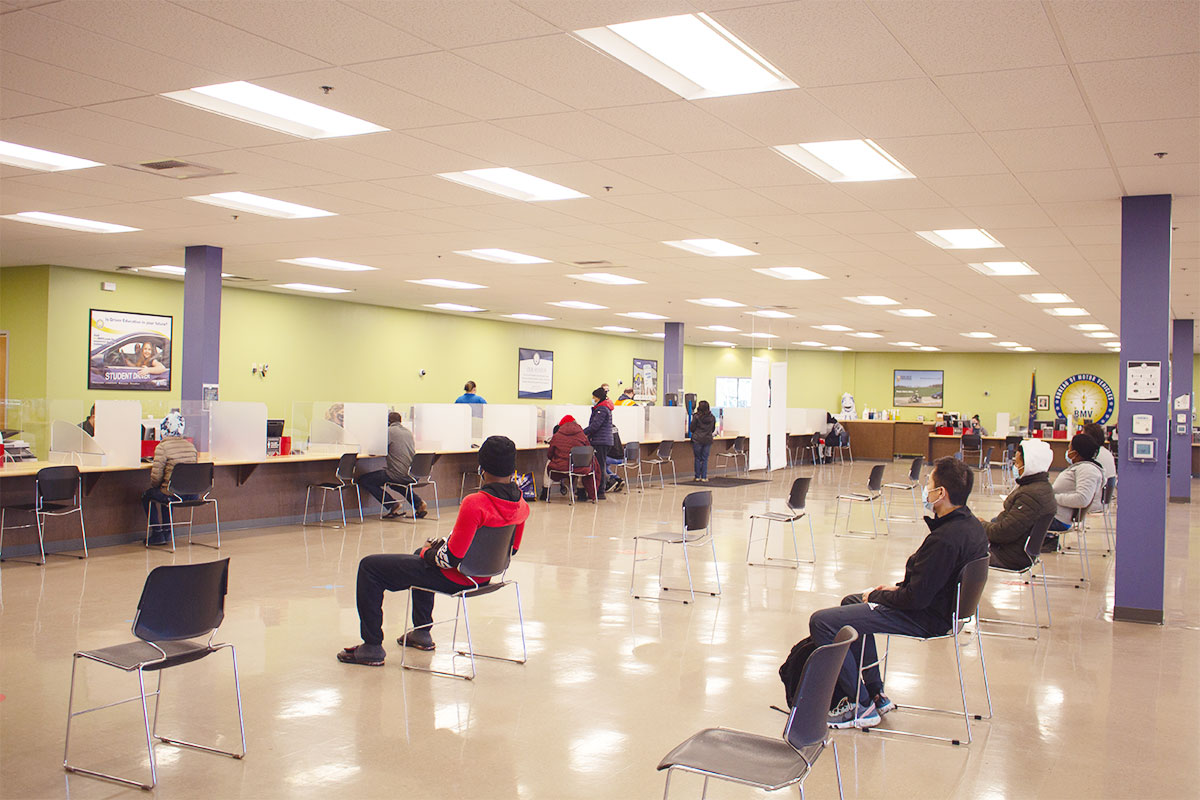 Customers sitting in the branch, socially distanced.