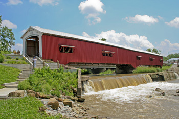 Covered bridge over low-head dam