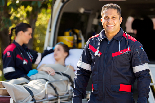 EMS workers and patient by ambulance