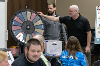 Man spinning wheel
