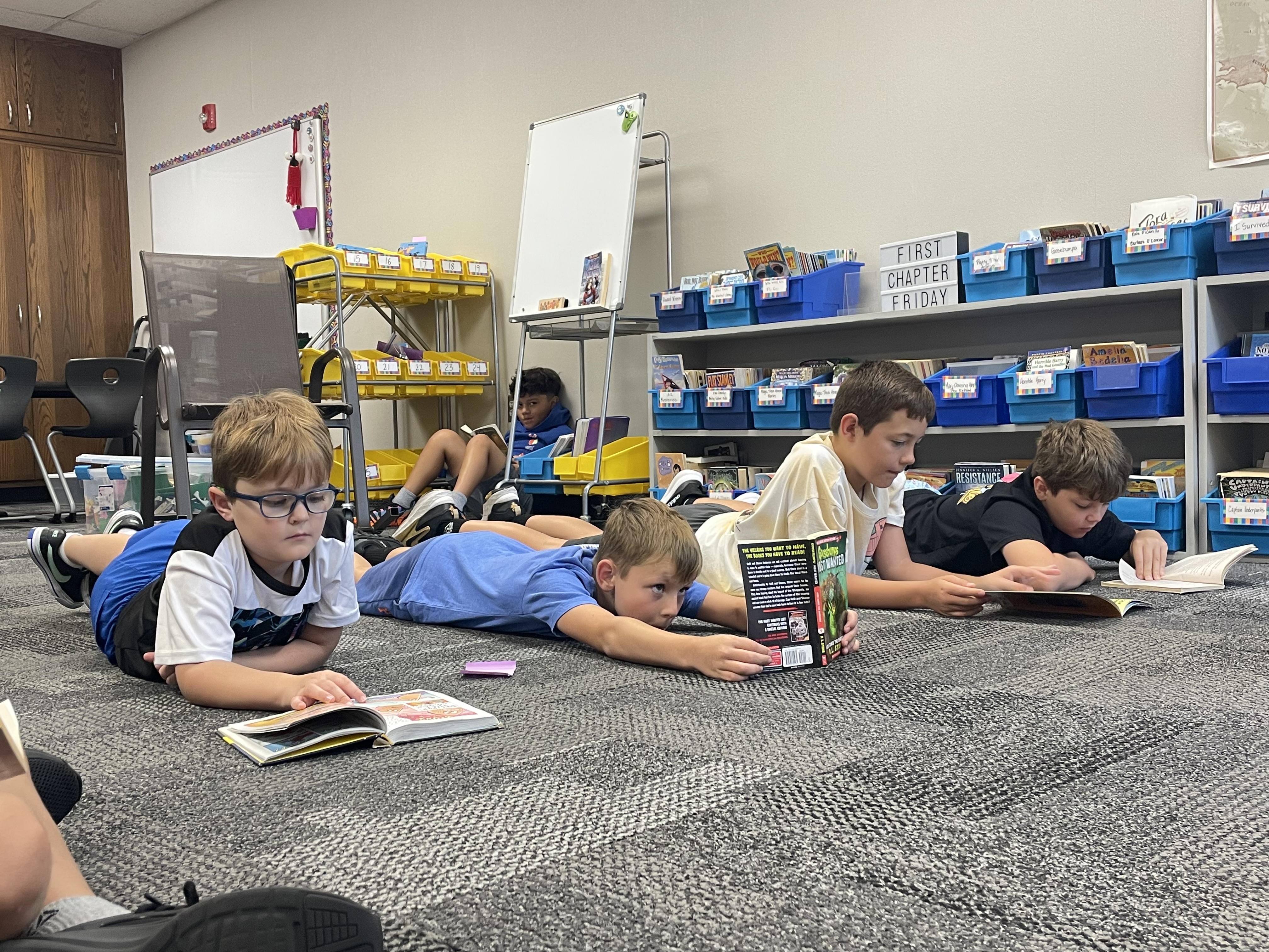 Students intently reading books