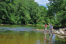Ron Anderson nets a Northern studfish while microfishing Sugar Creek last June with Jarrett Maurer. The Bloomington anglers seek and learn about many wild fish species most sportfish anglers overlook.