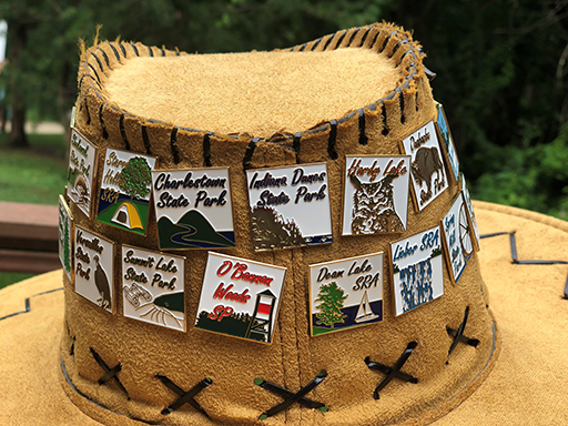 A hat exhibiting Hoosier Quest pins.