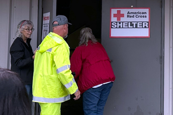 People entering Red Cross shelter