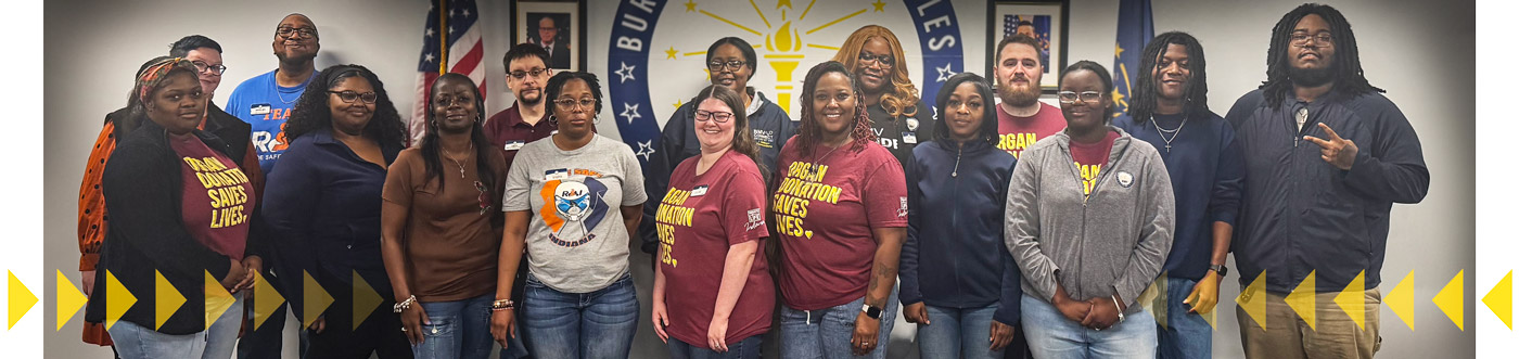 Indy East employees smiling together