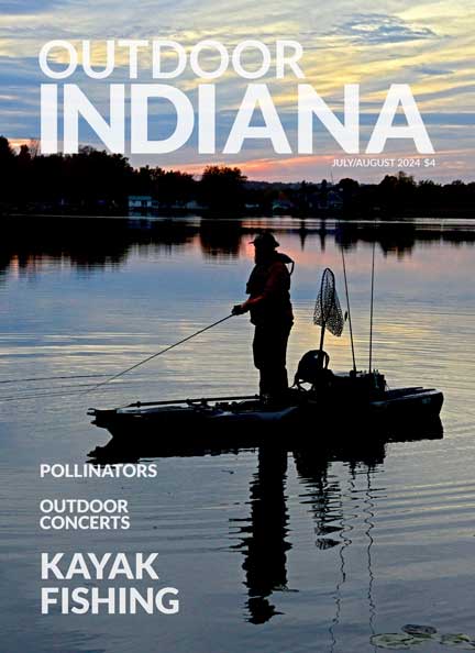 Tyson Opdycke of Fremont fishes Little Otter Lake in Steuben County before sunset. Opdycke’s sit-on-top kayak can be a stand-up kayak under calm conditions. Photo by John Maxwell.