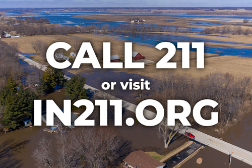 211 text over flooding scene