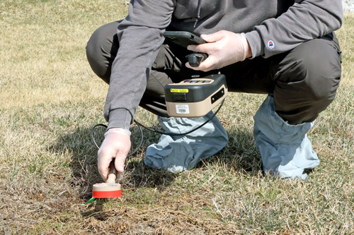Man samples the air for radiation during Cobalt Magnet exercise