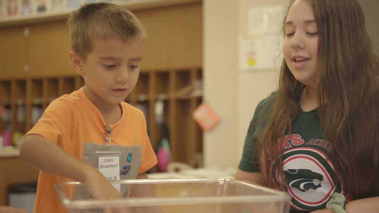 Two students working on a project at Lawrence Township