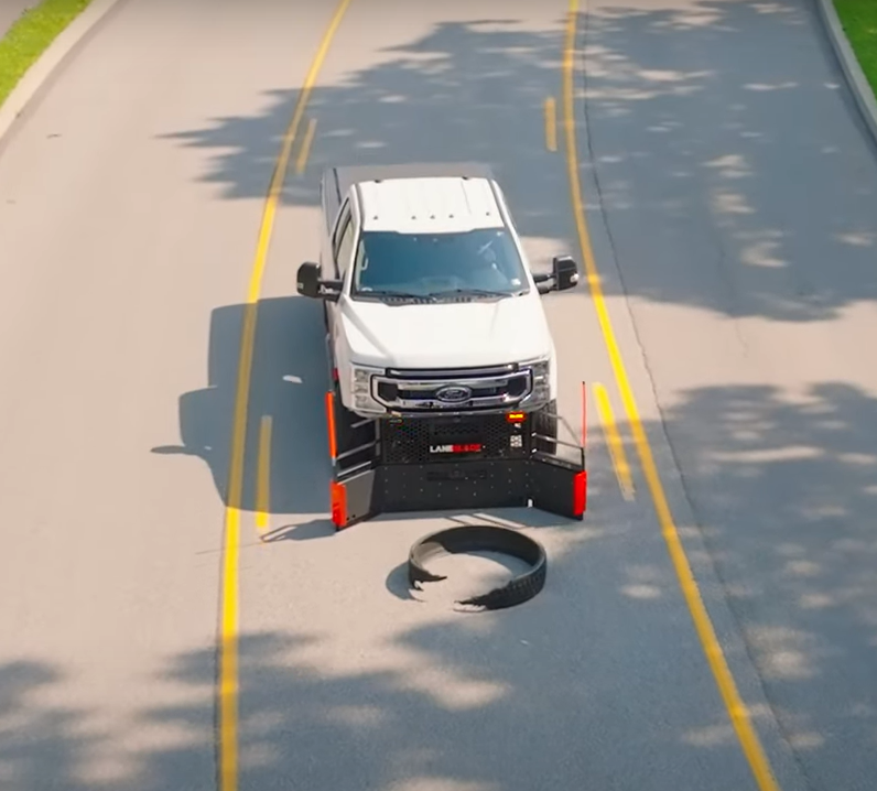Lane Blade Debris Removal System