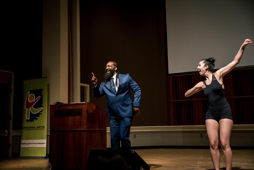 Image of deaf man signing and deaf woman dancing