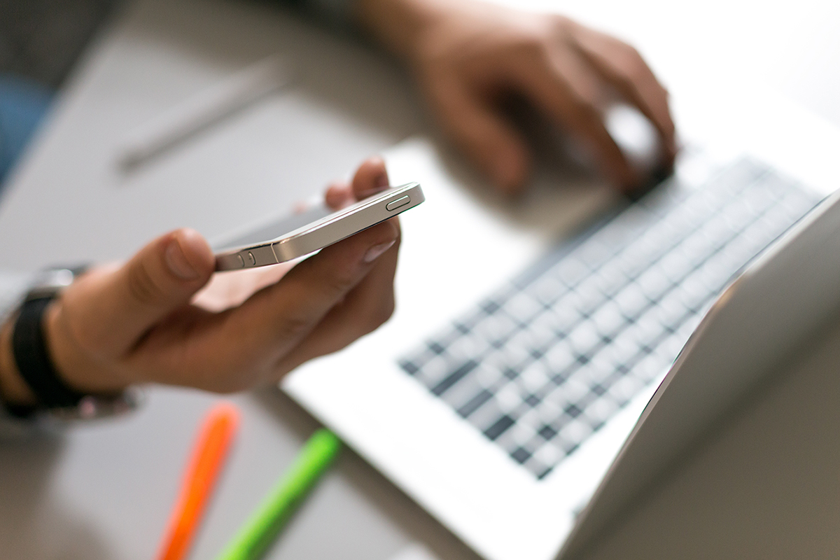 AdobeStock_114985810-Phone-and-Laptop-edited.jpg