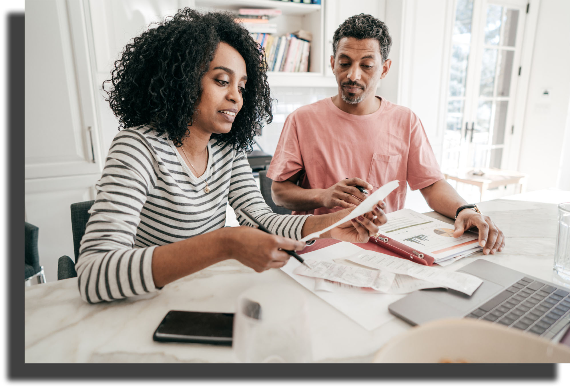 Image of a couple who are working on financial planning.