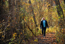 Cristin Bragg focuses on silence and slow movement while hiking a trail during a sensory walk at Salamonie Lake. 