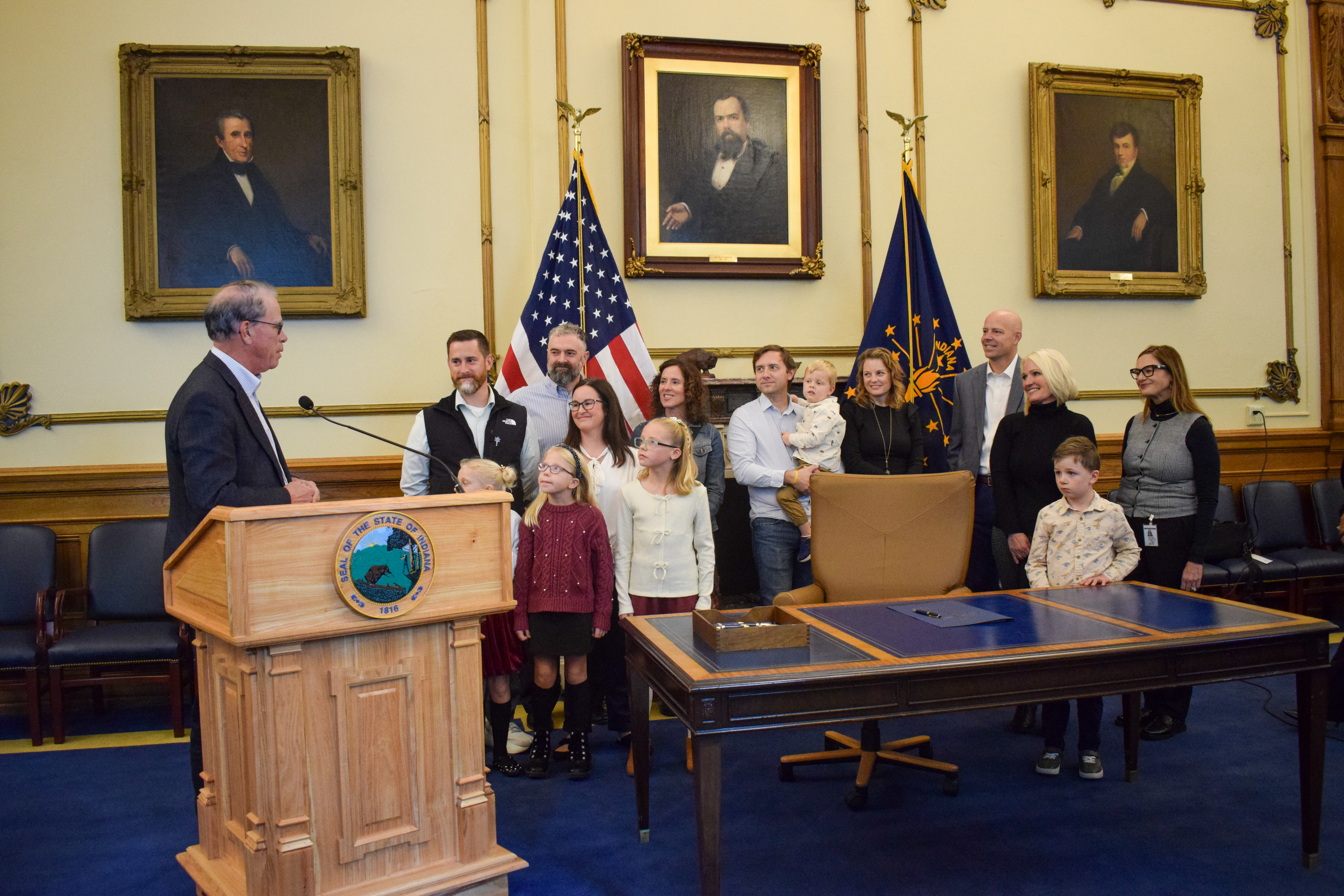 Gov. Braun delivering remarks to families and media.