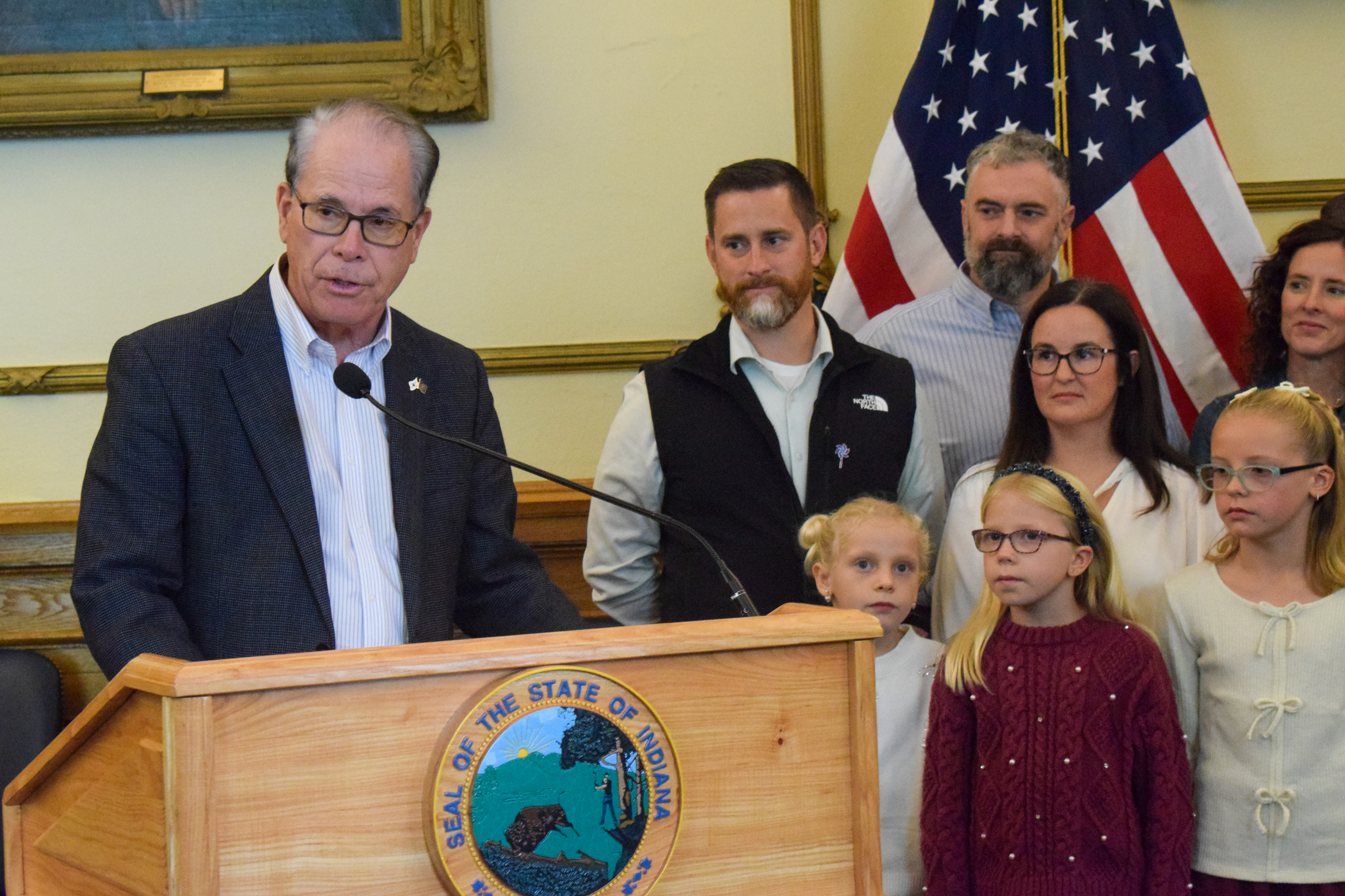 Gov. Braun delivering remarks to families and media.
