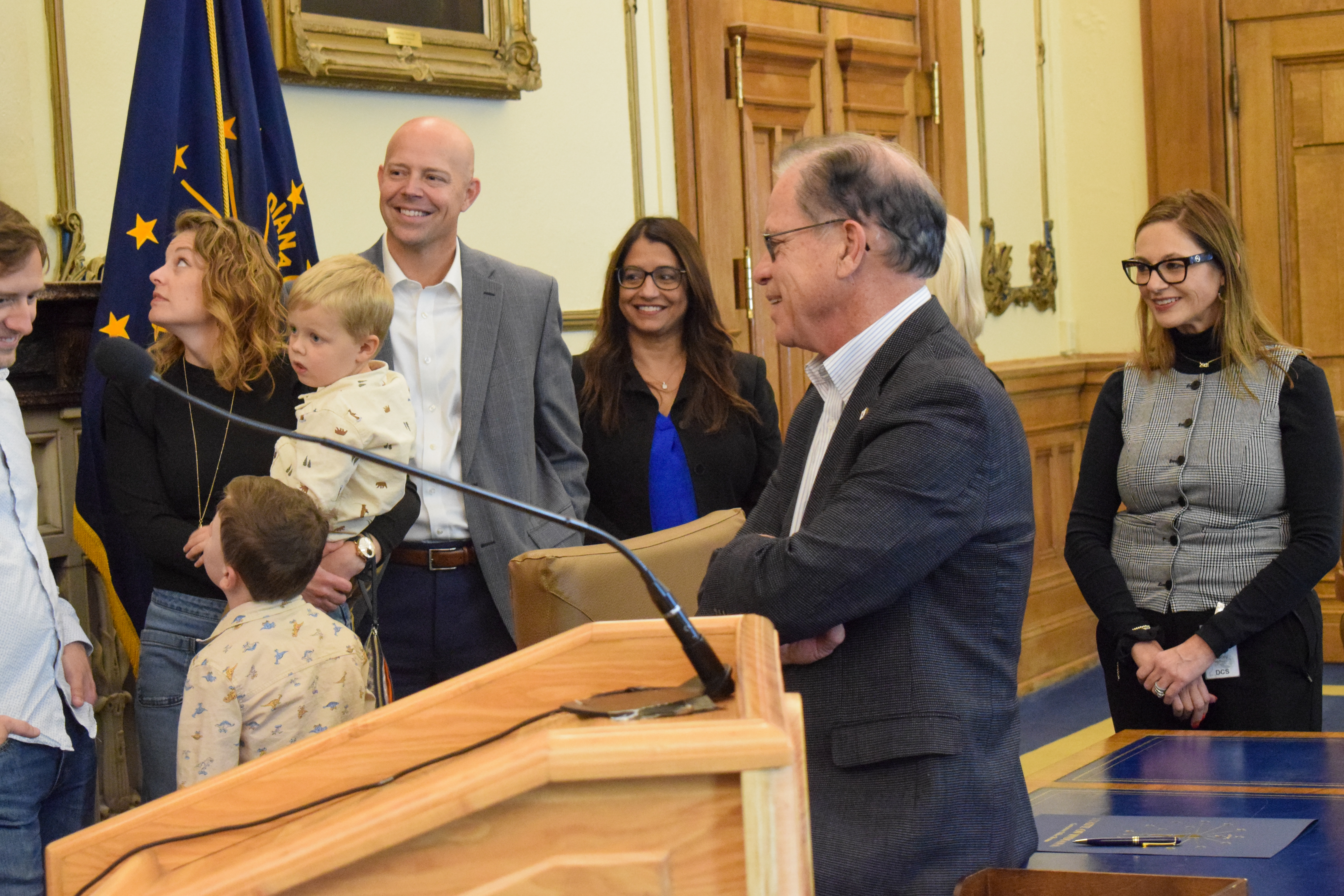 Gov. Braun speaking with families.