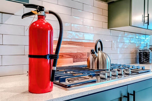 Fire extinguisher near stovetop