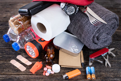 Disaster kit including food, water, blanket, flashlight