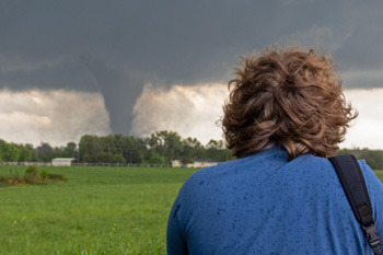 Storm spotter watching tornado