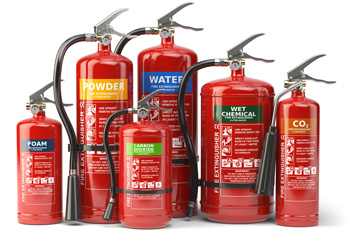 Row of fire extinguishers of different types and sizes
