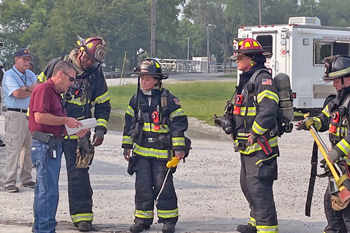 Firefighters receiving instructions