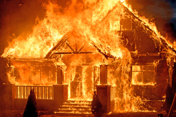 House completely engulfed in flames