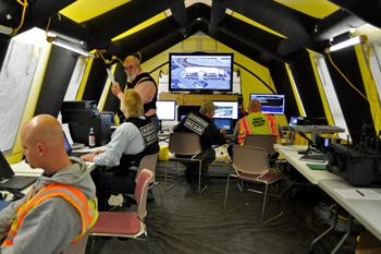 IBEAM tent exercise with personnel, monitors, and workstations