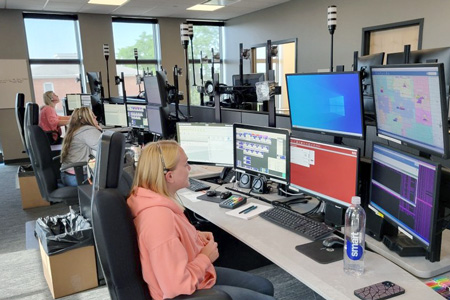 Telecommunicators in dispatch center