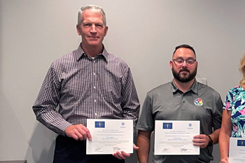 Allen County EMA director Bernie Beier and IDHS district liaison Dustin Drake recognized
