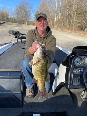 Rex Remington holds the state-record smallmouth bass he caught, March 3, 2024 on Monroe Lake.