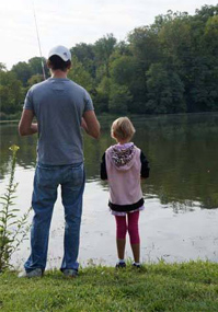 father and daughter fishing
