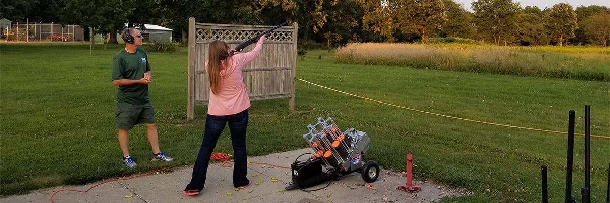 woman shooting at range