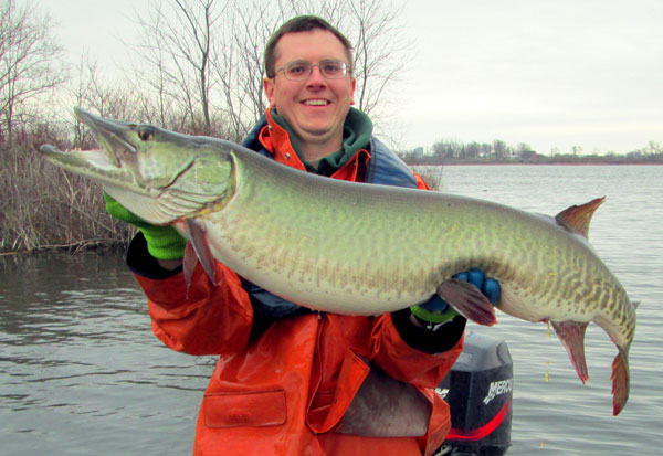 Man holding a large muskie