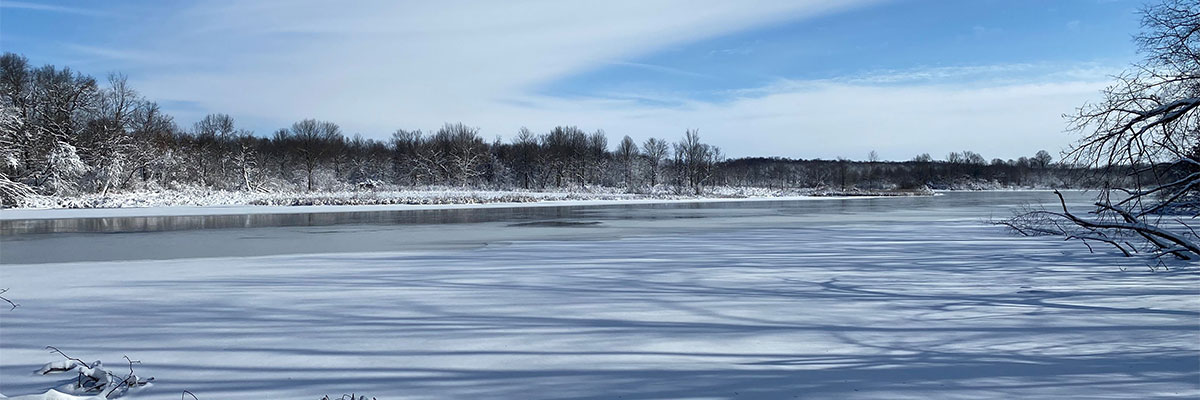 river in winter with ice