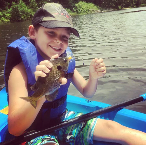 Boy with sunfish