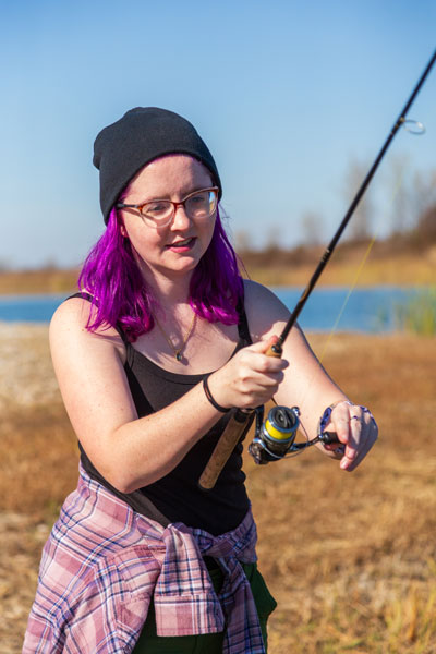 Women holding fishing pole