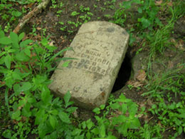 A fallen grave stone