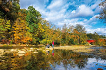 Boys enjoy the splendor of fall along Sugar Creek at Shades State Park