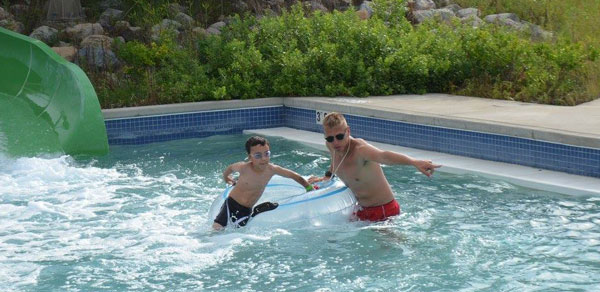 Man and boy in pool