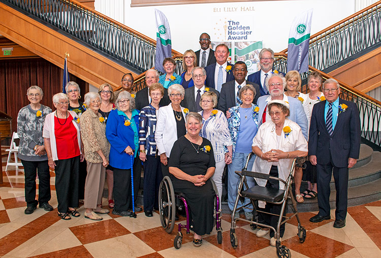 Picture of 2019 Golden Hoosier Award winners with the Lieutenant Governor and Master of Ceremonies