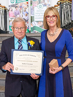 Picture of Merlin Foresman receiving the award from the Lieutenant Governor