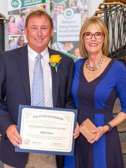 Picture of Robert Lacer receiving the award from the Lieutenant Governor