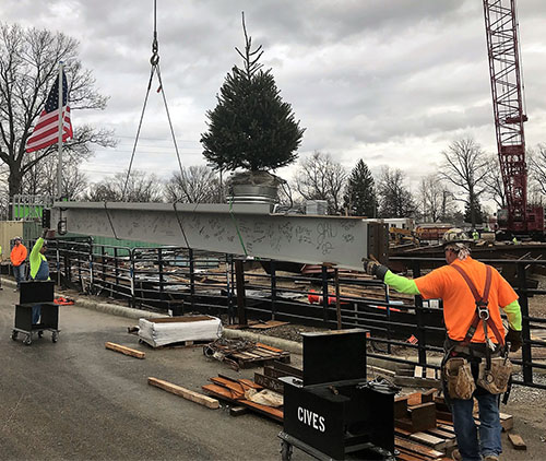 Photo of beam being lifted