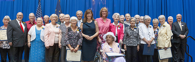 Photo of group of award recipients with the Lieutenant Govenor and FSSA Secretary